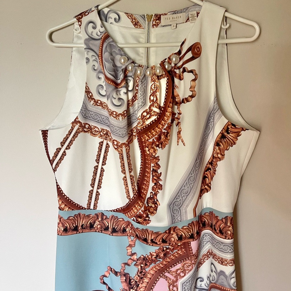 Ted Baker dress with large pearls at front collar. Ted Baker size 5. Like new.